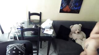 I masturbate my pussy in front of my stepsister in the living room of my house.