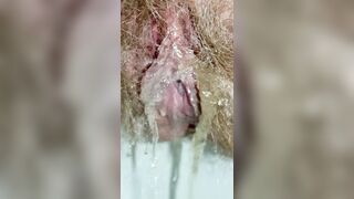 Super Close-Up View of Spreaded Peeing Hairy Pussy Up Close Pissing Fetish