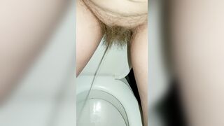 Point of view on the Hairy Pussy Pissing in the Toilet Powerful Standing Pee