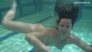 Babes swim strip and have fun underwater