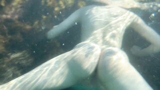 Naked pussy underwater at sea CLOSE UP