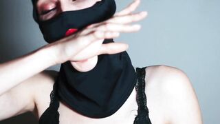 pussy in a balaclava with a rough tongue licks herself