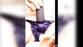 Masturbation with a dildo inserted through the gap between panties.