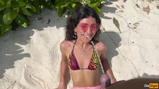 Katty pees powerfully on the beach and I give her golden shower on her face