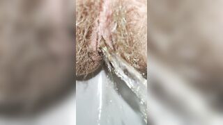 Long haired pussy pissing in the morning close up with a delicious fart