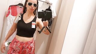 Amateur woman tries on clothes in a fitting room. Hairy pussy, big tits, big